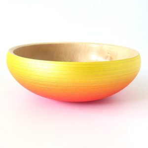 Red and yellow coloured sycamore bowl turned by Paul Hannaby creative woodturning